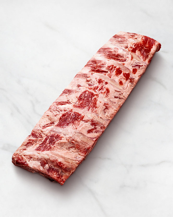 rohes Wagyu Beef Back Rib, weißer Hintergrund, marmoriert, Wagyurippe online kaufen